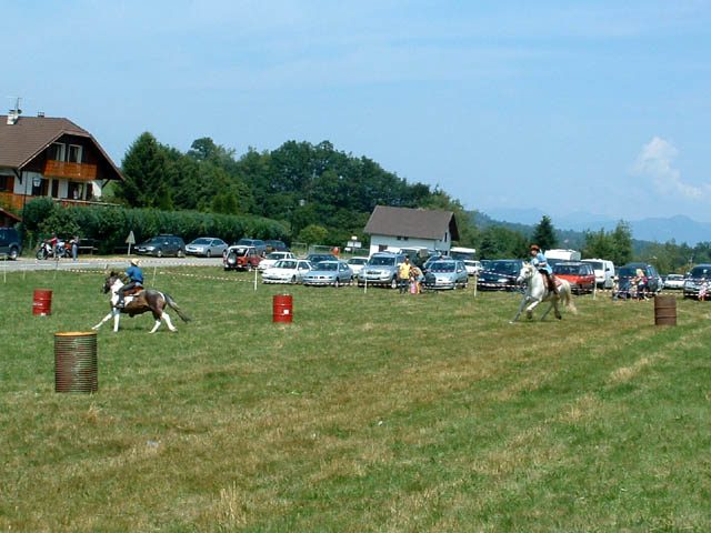 Fête western à 'Évires City', édition 2004 - le sam. 24 en soirée et le dim. 25 juillet 2004 ; Évires, Hte-Savoie. — « Fête western à 'Évires City', édition 2004 » —